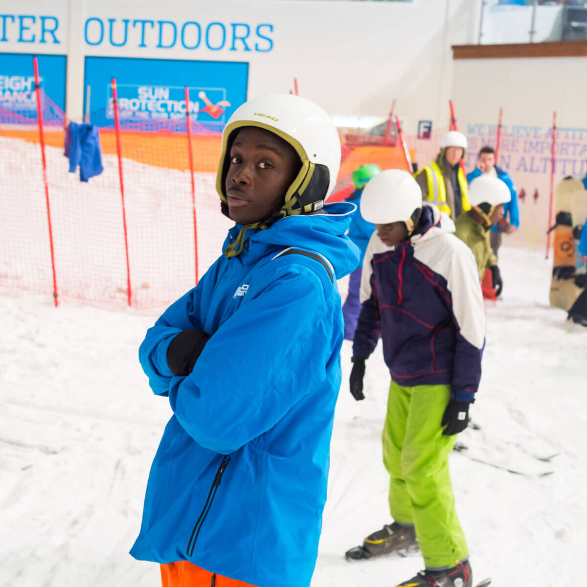 Snow-Camp First Tracks image - boy with crossed arms