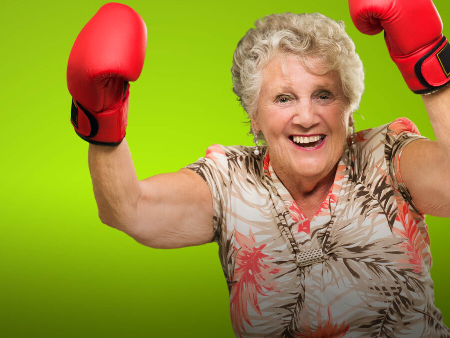 Energise Me website main image - older lady in boxing gloves